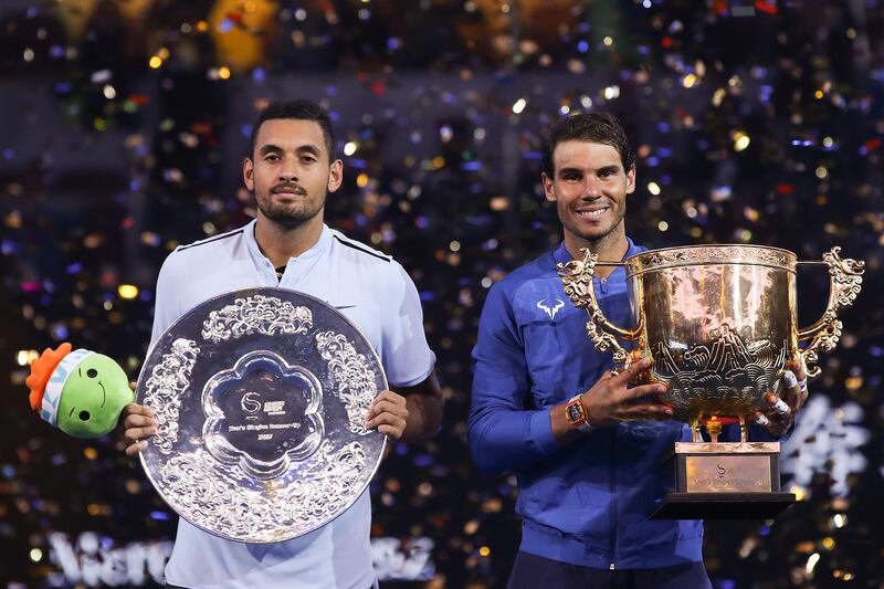 BEIJING, CHINA - OCTOBER 08:  Rafael Nadal of Spain holding the winner's trophy with Nick Kyrgios of Australia  poses for a picture after winning the Men's Singles final on day nine of the 2017 China Open at the China National Tennis Centre on October 8, 2017 in Beijing, China.  (Photo by Lintao Zhang/Getty Images)