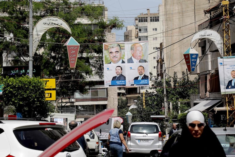 A picture taken on April 3, 2018 shows campaign poster for Lebanese Prime Minister Saad Hariri, for the upcoming Lebanese parliamentary election, hanging in the Tariq Jedideh district of Beirut.
As its first parliamentary vote in nearly a decade nears, Lebanon has been swept into campaign fever: posters on every corner, televised debates, and neighbours bickering over new electoral procedures. / AFP PHOTO / AFP- / Anwar AMRO