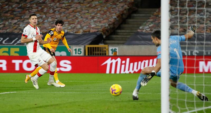 Southampton goalkeeper Alex McCarthy saves from Wolverhampton Wanderers' Pedro Neto. PA