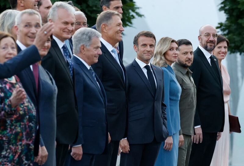 Emmanuel Macron next to the Ukrainian President's wife Olena Zelenska, Volodymyr Zelenskyy, European Council President Charles Michel and his partner Amelie Derbaudrenghien. AFP