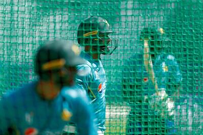 Pakistan's Mohammad Hafeez (C) looks on during a net practice session at Lords Cricket Ground in London on June 22, 2019, ahead of Pakistan's next 2019 Cricket World Cup match against South Africa. / AFP / Adrian DENNIS
