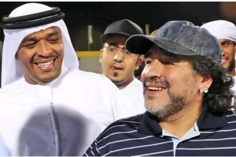 Diego Maradona, right, during his tour of the club's stadium on his visit to Dubai earlier this month. The Wasl chairman says the Argentine's storied past was never an issue in appointing him the club's new coach.