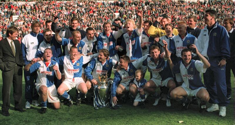 14 MAY 1995:  BLACKBURN ROVERS CELEBRATE WITH THE CUP AFTER CLINCHING THE FA CARLING PREMIERSHIP TROPHY DESPITE LOSING 1-2 TO LIVERPOOL IN THEIR FA CARLING PREMIERSHIP MATCH AT ANFIELD , LIVERPOOL. Mandatory Credit: Allsport UK/ALLSPORT