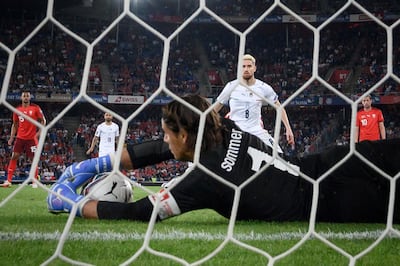 Switzerland goalkeeper Yann Sommer saves Jorginho's penalty. AFP