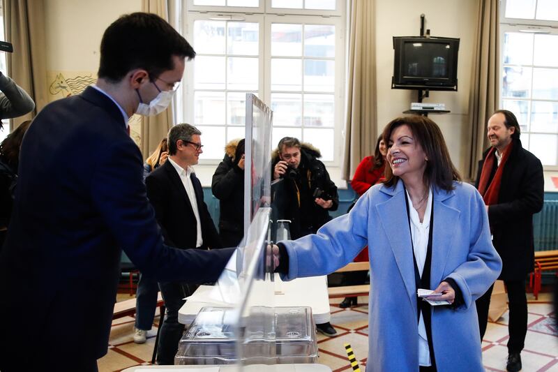 Mayor of Paris and presidential candidate Anne Hidalgo votes at a polling station in the French capital. EPA