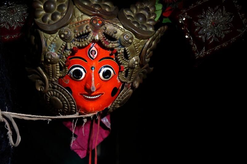 Masks used for dances in Indra Jatra Festival are hung in a room at Bhaktapur, Nepal. AP Photo