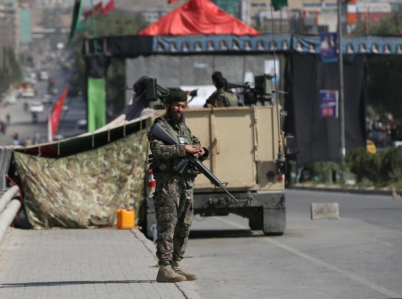 An Afghan National Army (ANA) soldier stands guard at a check point in Kabul, Afghanistan September 10, 2019. REUTERS/Omar Sobhani