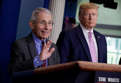 National Institute of Allergy and Infectious Diseases director Dr. Anthony Fauci speaks as U.S. President Donald Trump listens during the coronavirus response daily briefing at the White House in Washington, U.S., April 10, 2020. REUTERS/Yuri Gripas