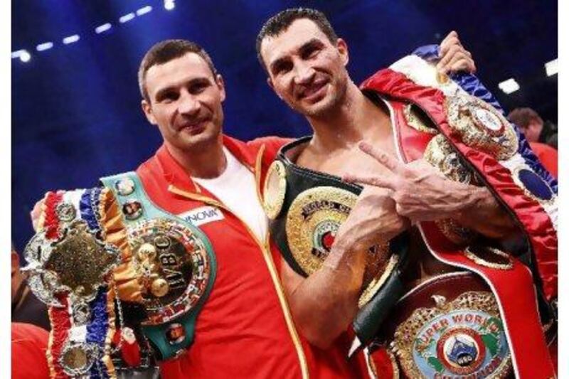 Wladimir Klitschko and his older brother, Vitali, now hold every world heavyweight belt following Wladimir's victory on Saturday night.