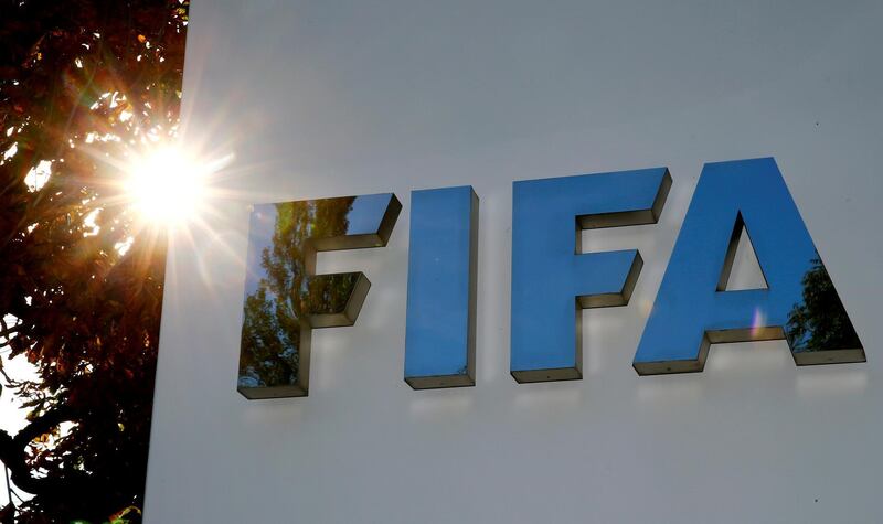 FILE PHOTO: The logo of FIFA is seen in front of its headquarters in Zurich, Switzerland September 26, 2017.   REUTERS/Arnd Wiegmann/File Photo