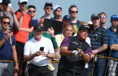 Phil Mickelson of the United States watches his shot from 9th tee the during a practice round ahead of the British Open Golf Championship, at Royal Birkdale, Southport, England Tuesday, July 18, 2017. (AP Photo/Dave Thompson)