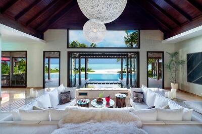The living room of a family beach pavilion room at Niyama Private Islands Maldives. Niyama Private Islands Maldives r