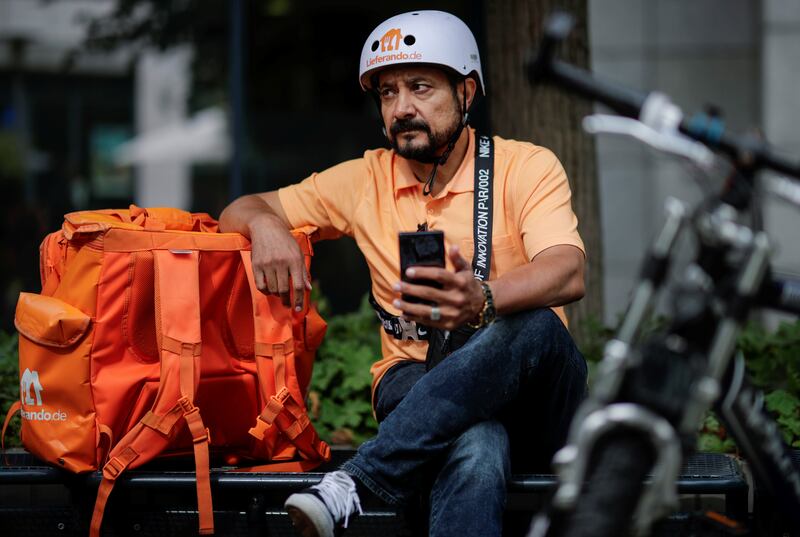 Sayed Sadaat sits with his gear in Leipzig, Germany. Reuters