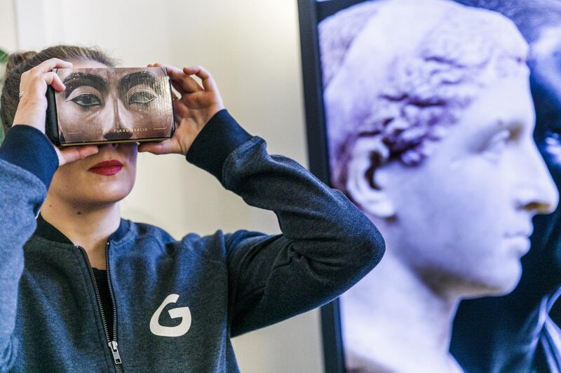 BERLIN, GERMANY - JANUARY 22: An employee looks in a giant Google VR goggles  during the press tour before the festive opening of the Berlin representation of Google Germany on January 22, 2019 in Berlin, Germany. The official opening will take place tonight with Berlin Mayor Michael Muller. (Photo by Carsten Koall/Getty Images)