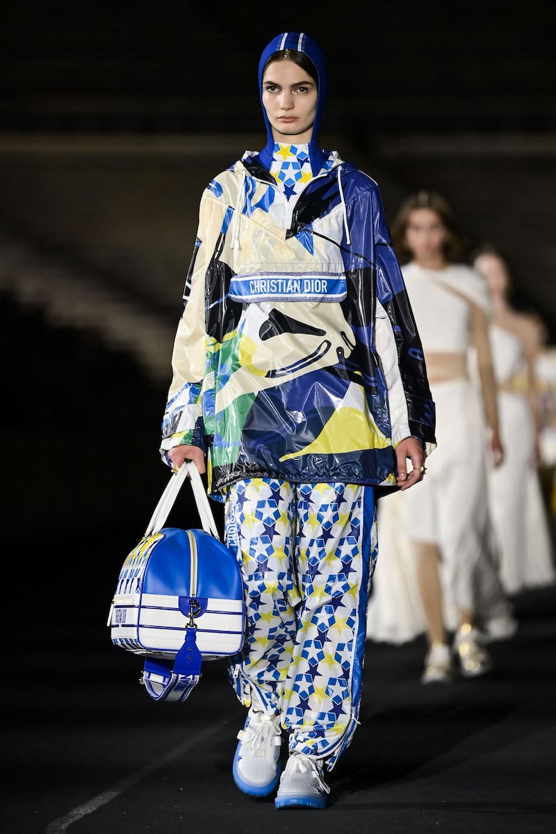 A model walks the runway during the Dior Cruise show 2022 at Panathenaic Stadium on June 17, 2021 in Athens, Greece. AFP