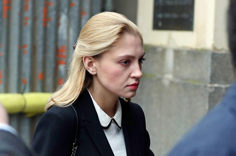 Student Lavinia Woodward arrives at Oxford Crown Court to be sentenced,  in Oxford, England, Monday Sept. 25, 2017. An Oxford University student who stabbed her boyfriend with a bread knife will be able to avoid prison after receiving a suspended sentence.  Woodward was given a 10-month suspended sentence. (Andrew Matthews/PA via AP)