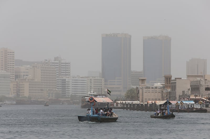 DUBAI , UNITED ARAB EMIRATES – July 19 , 2016 : View of the Dubai creek during the dusty and hot weather in Dubai. ( Pawan Singh / The National ) For News. ID No : 32434 *** Local Caption ***  PS1907- DUST16.jpg