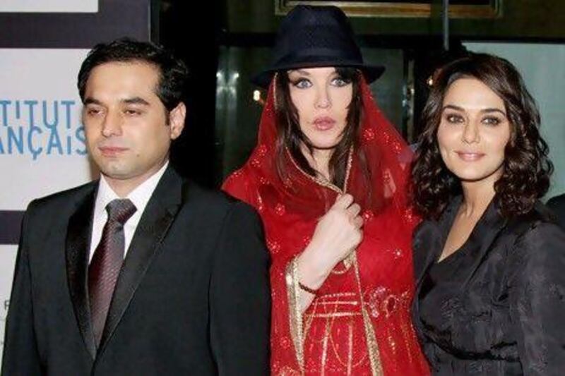 Prem Raj, left, the director of Ishkq In Paris, with the French actress Isabelle Adjani and Preity Zinta. Adjani makes her Bollywood debut in the film. Getty Images