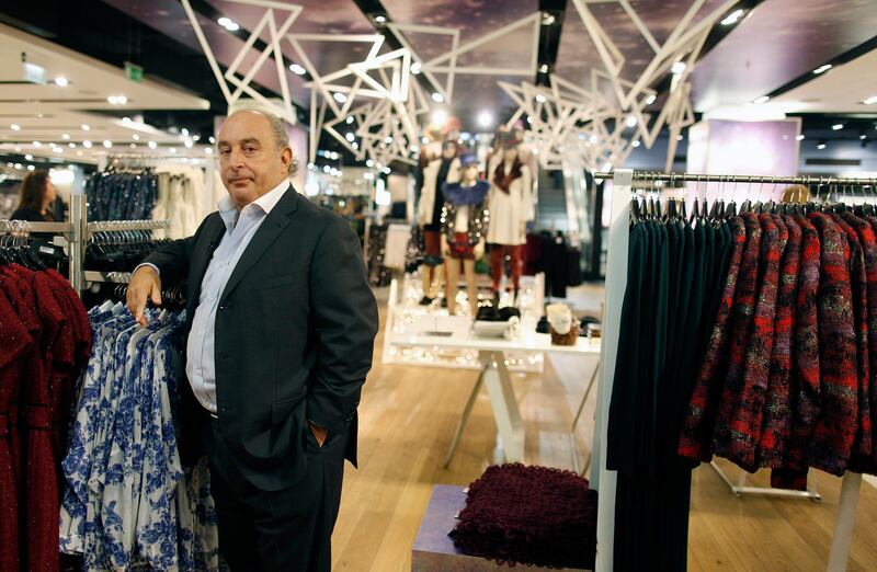 Philip Green, the billionaire owner of fashion retailer Arcadia Group Ltd., poses for a photograph following a Bloomberg Television interview inside a Topshop store on Oxford Street in London, U.K., on Wednesday, Dec. 6, 2012. Green, the billionaire owner of the Arcadia fashion business, sold a 25 percent stake in the Topshop and Topman retail chains to Leonard Green & Partners LP, the co-owner of the J Crew fashion brand, in a deal valuing the businesses at 2 billion pounds ($3.2 billion). Photographer: Simon Dawson/Bloomberg Photographer: Simon Dawson/Bloomberg *** Local Caption *** Philip Green