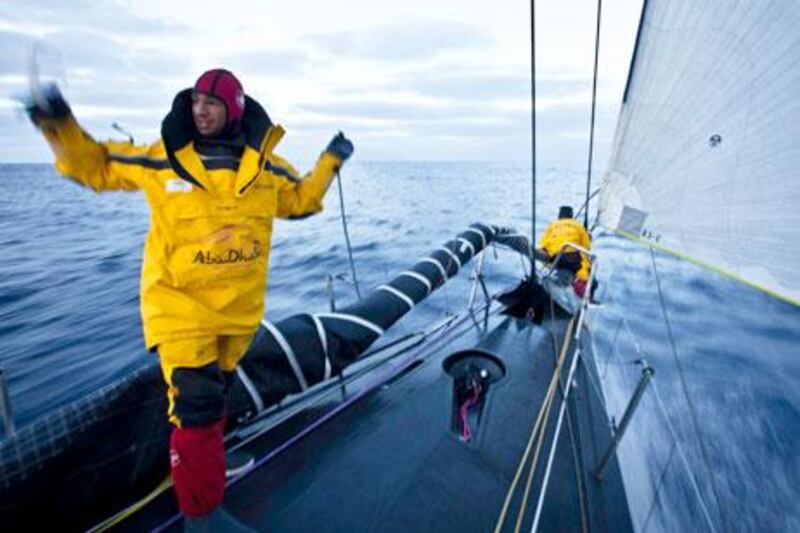 Adel Khalid signals for more slack for the sail as Azzam and crew speed towards the dangerous waters that surround Cape Horn on their journey to complete Leg 5 of the Volvo Ocean Race at Itajai, Brazil.