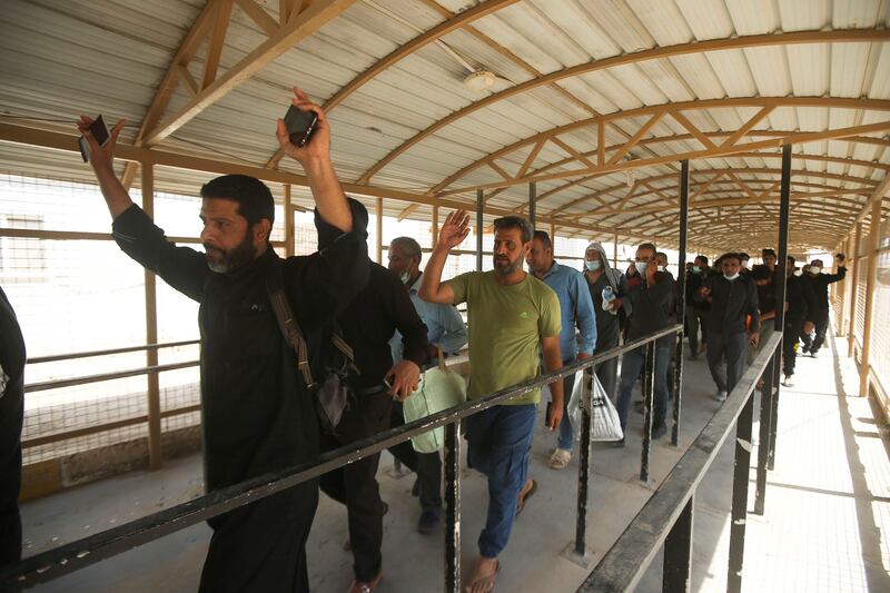 Pilgrims arrive to participate in the holy Shi'ite ritual of Arbaeen, on the Iraqi side of the Shalamcha Border Crossing in Basra, Iraq.  REUTERS