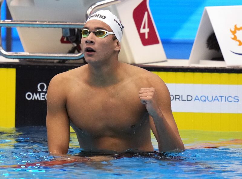 Ahmed Hafnaoui of Tunisia celebrates after winning the men's 800m freestyle final in Fukuoka, Japan. EPA