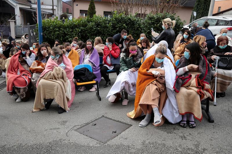 Patients and medical staff are evacuated outside the Sveti Duh Hospital after an earthquake in Zagreb, Croatia.  REUTERS