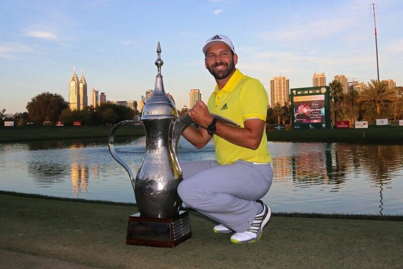 Sergio Garcia poses with the Dallah Trophy after winning the 2017 Omega Dubai Desert Classic. Nezar Balout / EPA