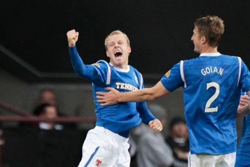 Rangers’ Steven Naismith, left, has stated an interest in reprsenting the British Olympic Team in the summer.  Naismith, 25, will be vying for one of only three places allocated to players over age 22.