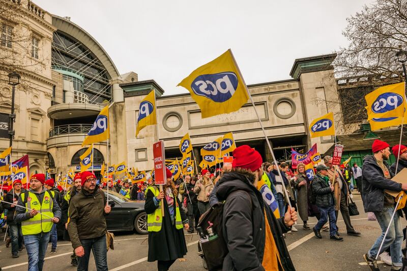 Striking civil servants march through Westminster in London. Bloomberg