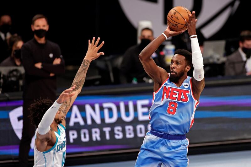 Brooklyn Nets forward Jeff Green shoots over Charlotte Hornets forward Miles Bridges during the first half of an NBA basketball game Thursday, April 1, 2021, in New York. (AP Photo/Adam Hunger)