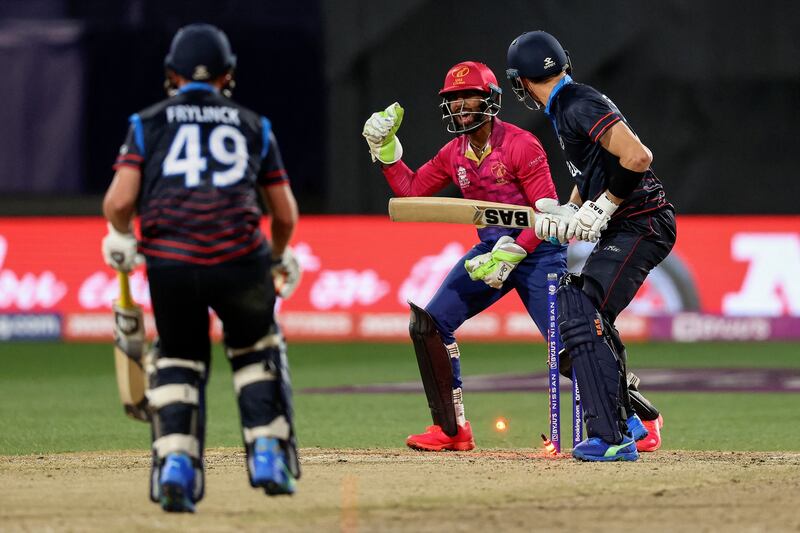 Namibia batter Gerhard Erasmus is bowled by UAE's Karthik Meiyappan for 16. AFP