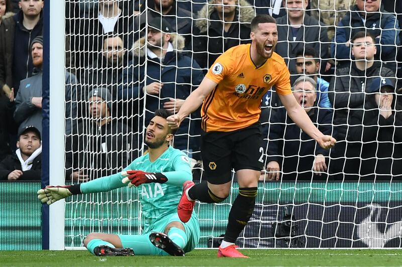 (FILES) In this file photo taken on March 1, 2020 Tottenham Hotspur's Argentinian goalkeeper Paulo Gazzaniga (L) reacts as Wolverhampton Wanderers' Irish defender Matt Doherty celebrates after scoring their first goal during the English Premier League football match between Tottenham Hotspur and Wolverhampton Wanderers at the Tottenham Hotspur Stadium in London/ Tottenham on Sunday, August 30, announced the signing of defender Matt Doherty from Premier League rivals Wolves for an undisclosed fee reported to be £15 million ($20 million). - RESTRICTED TO EDITORIAL USE. No use with unauthorized audio, video, data, fixture lists, club/league logos or 'live' services. Online in-match use limited to 120 images. An additional 40 images may be used in extra time. No video emulation. Social media in-match use limited to 120 images. An additional 40 images may be used in extra time. No use in betting publications, games or single club/league/player publications.
 / AFP / DANIEL LEAL-OLIVAS / RESTRICTED TO EDITORIAL USE. No use with unauthorized audio, video, data, fixture lists, club/league logos or 'live' services. Online in-match use limited to 120 images. An additional 40 images may be used in extra time. No video emulation. Social media in-match use limited to 120 images. An additional 40 images may be used in extra time. No use in betting publications, games or single club/league/player publications.
