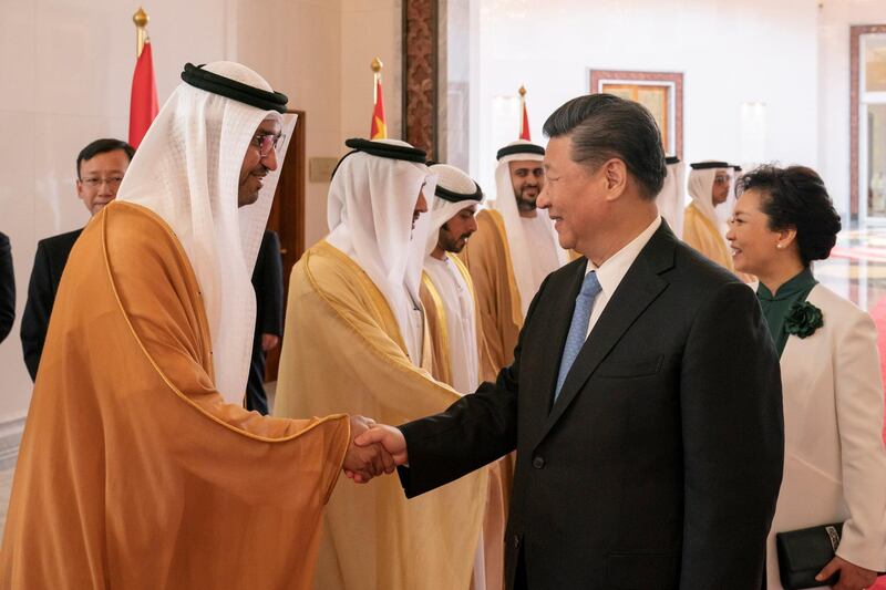 ABU DHABI, UNITED ARAB EMIRATES - July 21, 2018: HE Dr Sultan Ahmed Al Jaber, UAE Minister of State, Chairman of Masdar and CEO of ADNOC Group (L) bids farewell to HE Xi Jinping, President of China (front R), at the Presidential Airport. Seen with Peng Liyuan, First Lady of China (back R).

( Hamad Al Kaabi / Crown Prince Court - Abu Dhabi )
---