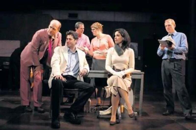 From left, Jim Fletcher, Gary Wilmes, Vin Knight, Kate Scelsa, Victoria Vazquez and Scott Shepherd in a scene from Gatz, at The Public Theater in New York.
