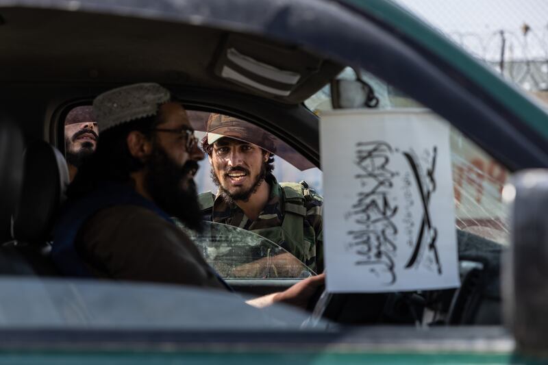 Taliban guards patrol Kabul's roads. Stefanie Glinski / The National