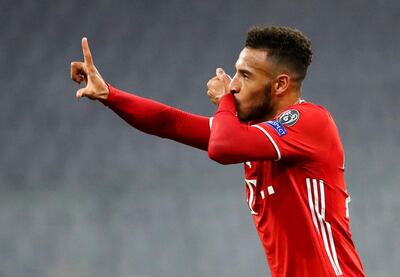 Bayern Munich's Corentin Tolisso celebrates after scoring his team's third goal during the Champions League Group A soccer match between Bayern Munich and Atletico Madrid at the Allianz Arena in Munich, Germany, Wednesday, Oct. 21, 2020. (AP Photo/Matthias Schrader,Pool)