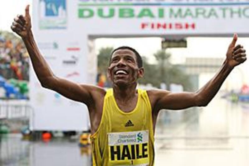 Haile Gebrselassie, pictured here winning the Dubai Marathon in January, believes he can improve on the UK record of 27mins 02secs set in 2007.