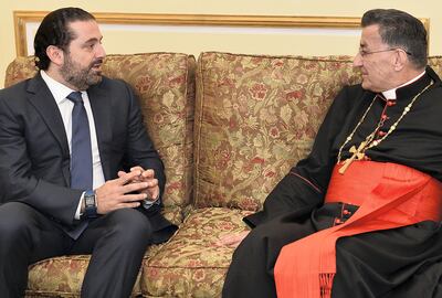 This handout picture released by the press office of Lebanon's Maronite Patriarchate shows Lebanon's resigned prime minister Saad Hariri meeting with Lebanon's Christian Maronite patriarch Beshara Rai on November 14, 2017, in the Saudi capital Riyadh. / AFP PHOTO / Lebanon's Maronite Patriarchate press office / Handout / RESTRICTED TO EDITORIAL USE - MANDATORY CREDIT "AFP PHOTO / HO / LEBANON'S MARONITE PATRIARCHATE" - NO MARKETING NO ADVERTISING CAMPAIGNS - DISTRIBUTED AS A SERVICE TO CLIENTS