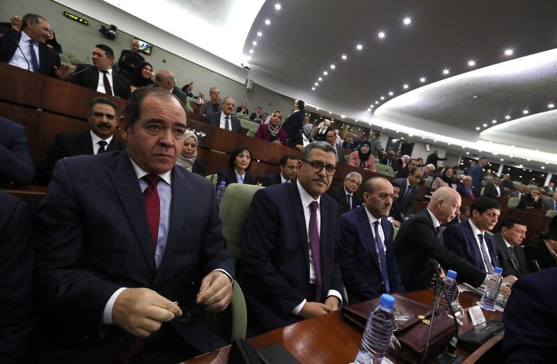 Algeria's foreign minister Sabri Boukadoum, left, and Algerian prime minister Abdelaziz Djeradattend a session to present government's action plan to the National People's Assembly in Algiers.  EPA