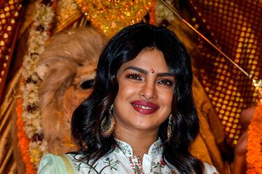 Bollywood actress Priyanka Chopra Jonas poses for photographs during 'Durja Puja' celebrations at the 72nd North Bombay Sarbojanin Durga Puja Samiti festival in Mumbai on October 6, 2019. / AFP / STR