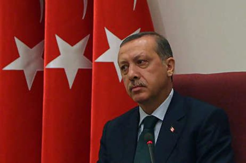 The Turkish prime minister, Recep Tayyip Erdogan, attending annual military meetings in Ankara on Sunday. Mr Erdogan rejected the move of Gen Hasan Igsiz to the post of land forces commander.