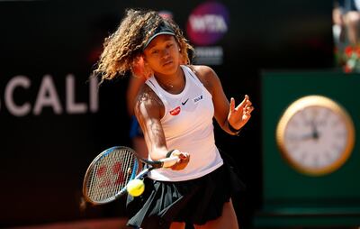 ROME, ITALY - MAY 16:  Naomi Osaka of Japan plays a forehand against Dominika Cibulkova of Slovakia in their Women's Round of 32 match during Day Five of the International BNL d'Italia at Foro Italico on May 16, 2019 in Rome, Italy. (Photo by Adam Pretty/Getty Images)