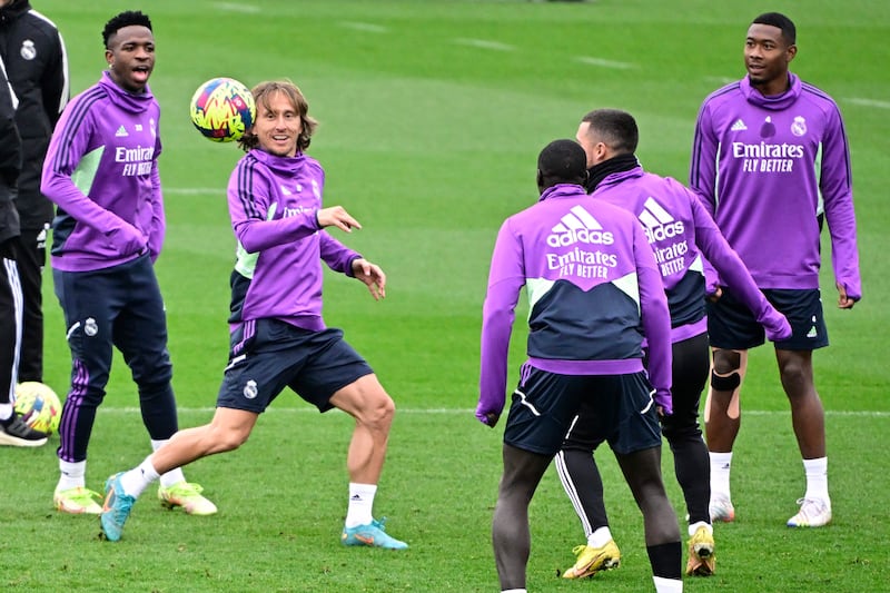 Vinicius Junior, left, and Luka Modric during Real Madrid's training session. AFP