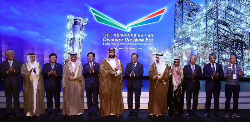 Saudi Arabian Crown Prince Mohammad bin Salman, centre left, and South Korean President Moon Jae-in, centre right, clap during a ceremony marking the completion of petroleum facility of South Korea's S-Oil Corp at a hotel in Seoul, South Korea.  AP