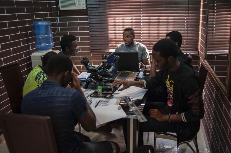The team of illustrators meets at the Comic Republic office in Lagos. Stefan Heunis / AFP