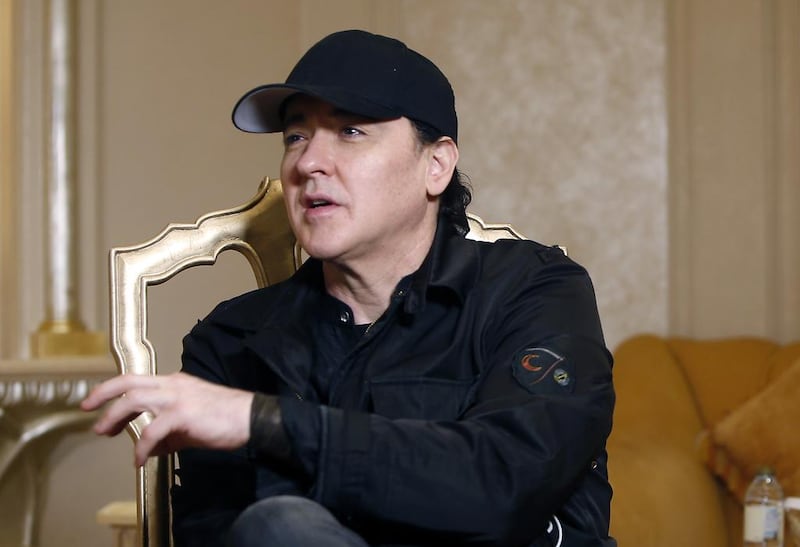 John Cusack talks to The National at Emirates Palace during his visit to the Capital to host a meal as part of the Abu Dhabi Food Festival. Ravindranath K / The National