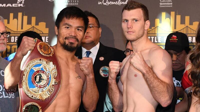 Manny Pacquiao, left, and Jeff Horn square up during the weigh-in ahead of their fight. Dave Hunt / EPA