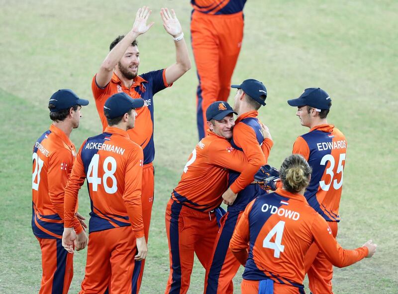 Dubai, United Arab Emirates - November 02, 2019: Netherland's Tobias Visee runs out PNG's Assadollah Vala during the game between Papua New Guinea and the Netherlands in the T20 World Cup Qualifier final at the Dubai International Cricket Stadium. Saturday the 2nd of November 2019. Sports City, Dubai. Chris Whiteoak / The National
