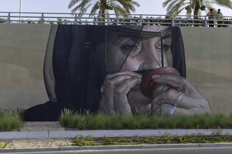 A mural along the E10 motorway in Al Raha showcases elements of the UAE’s heritage. Christopher Pike / The National